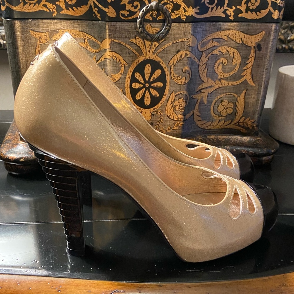 Chanel gold and black patent pumps